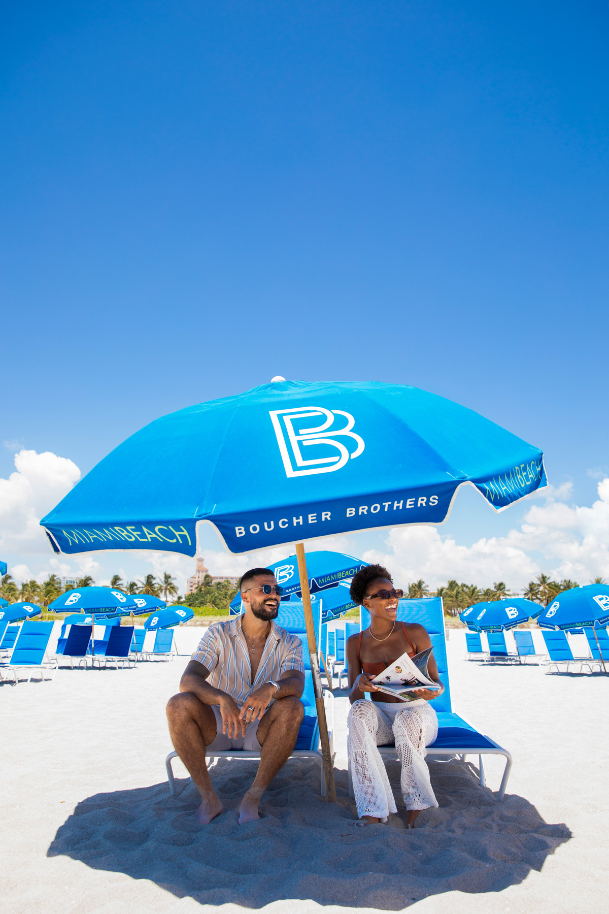 A single padded lounge chair facing an empty morning ocean.